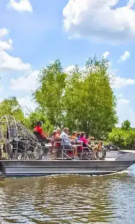 Airboat cruising through Louisiana wetlands